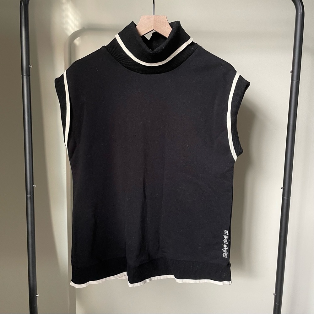 WKND Nation Fleece Turtleneck Tank in Black with Cream Lining
